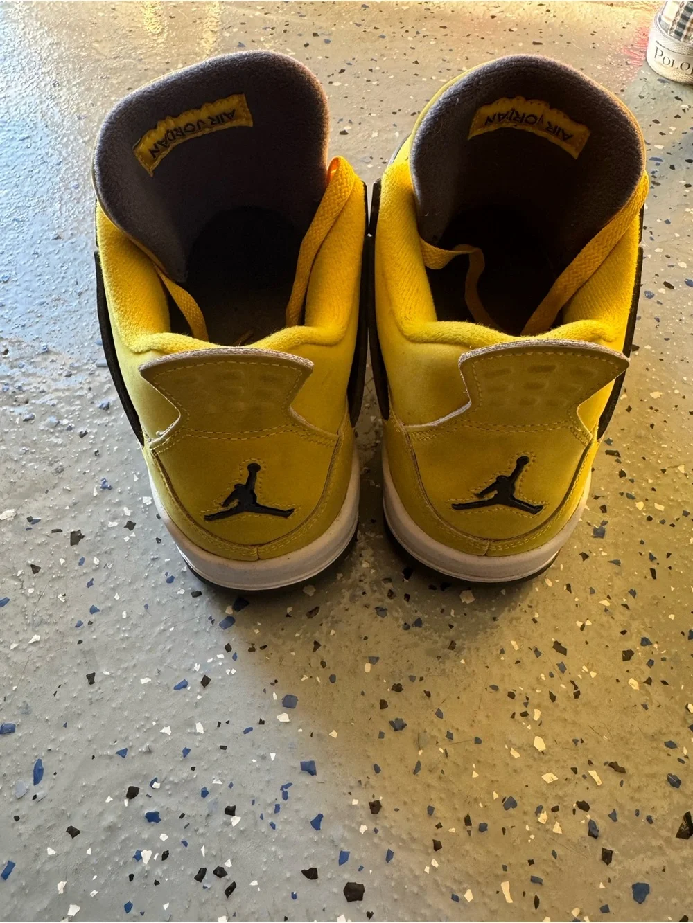 Jordan Yellow and Black Retro 4 Sneakers “Yellow Lightning”
